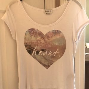 Bebe short sleeve graphic top.